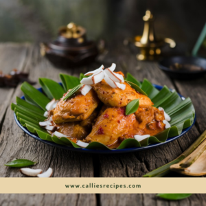 Nariyal chicken recipe served on wooden table with coconut garnish