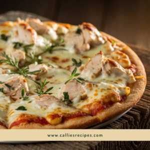 Hot and fresh Chicken Alfredo Pizza with melted cheese stretching as a slice is pulled away